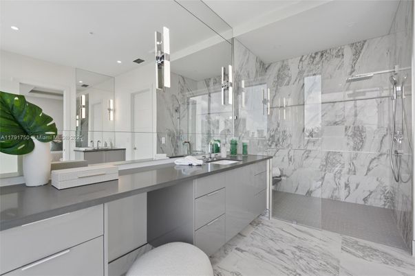 Bathroom, Dual Sink Vanities, Glass Shower, Interior, Marble, Marble Walls, Recessed Lighting