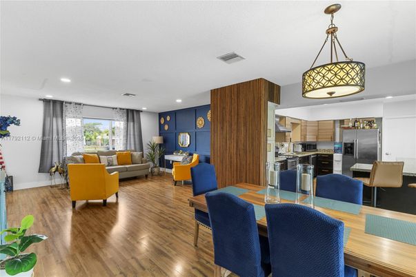 Dining room, Interior, Kitchen, Living room, Pendant Lights, Recessed Lighting, Stainless Steel Appliances, Wood Texture Flooring
