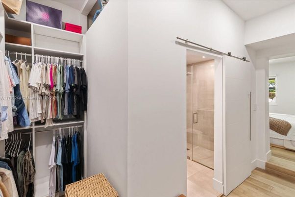 Bathroom, Glass Shower, Interior, Recessed Lighting, Walk-in Closets, Wood Texture Flooring