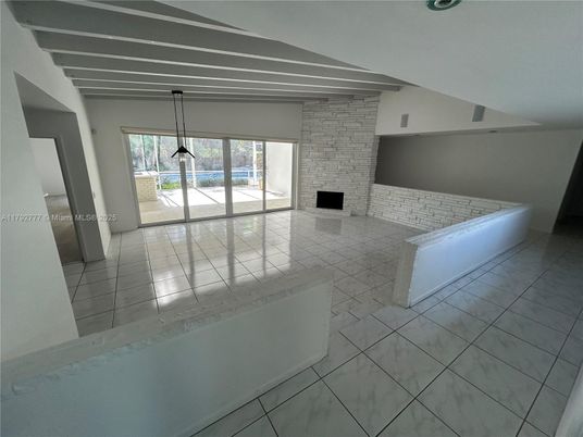 Empty room, Fireplace, Interior, Marble, Pendant Lights, Stone Walls