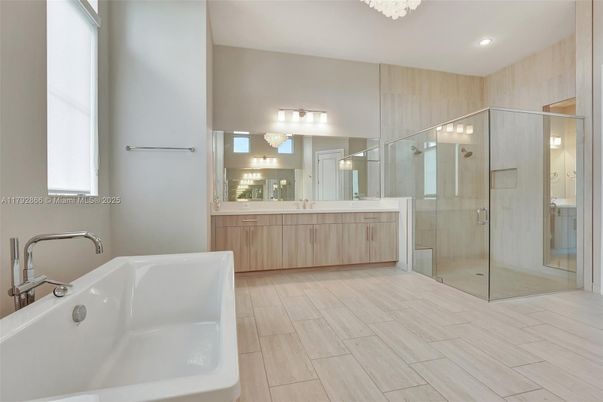 Bathroom, Dual Sink Vanities, Glass Shower, Interior, Recessed Lighting, Wood Texture Flooring