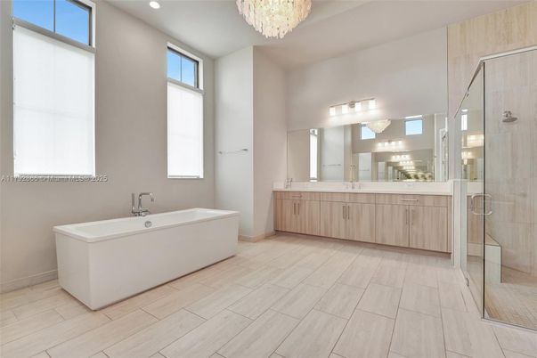 Bathroom, Chandelier, Dual Sink Vanities, Glass Shower, Interior, Recessed Lighting, Wood Texture Flooring