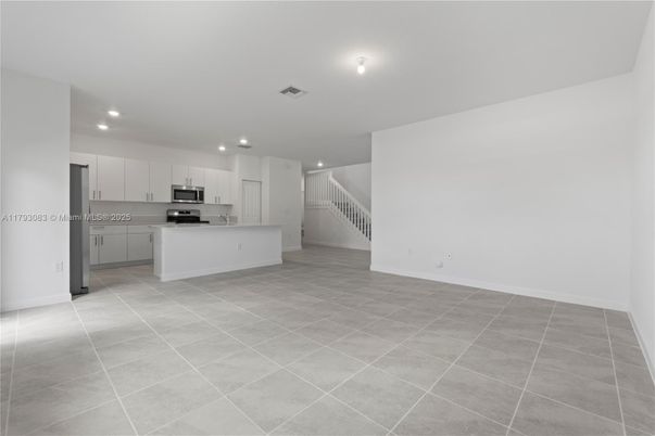 Empty room, Interior, Kitchen, Recessed Lighting, Stainless Steel Appliances