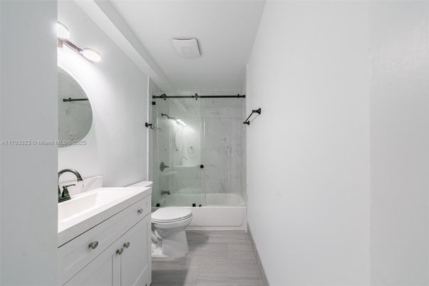 Bathroom, Glass Shower, Interior, Marble Walls, Wood Texture Flooring