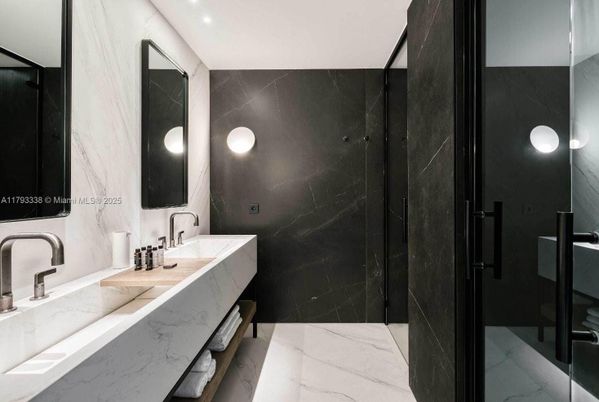 Bathroom, Dual Sink Vanities, Glass Shower, Interior, Marble, Marble Walls, Recessed Lighting