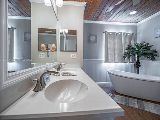 Bathroom, Dual Sink Vanities, Free Standing Baths, Interior, Recessed Lighting, Wooden Ceilings, Wood Texture Flooring