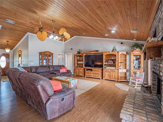 Fireplace, Interior, Living room, Pendant Lights, Recessed Lighting, Wooden Ceilings, Wood Texture Flooring