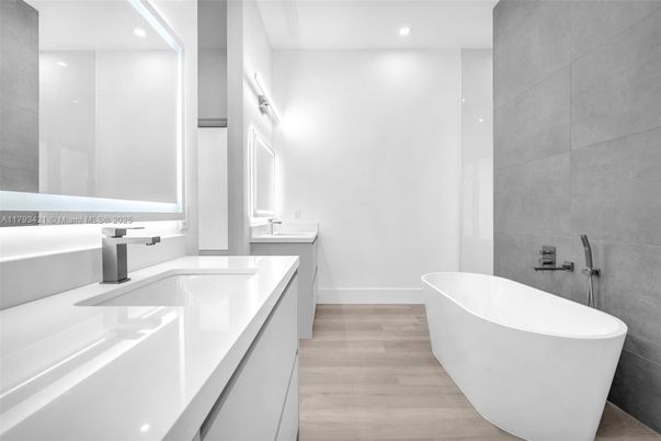 Bathroom, Dual Sink Vanities, Free Standing Baths, Interior, Recessed Lighting, Wood Texture Flooring