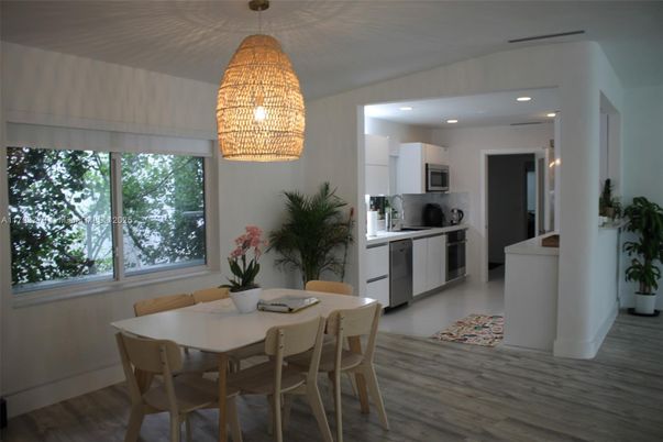 Chandelier, Dining room, Interior, Kitchen, Recessed Lighting, Stainless Steel Appliances, Wood Texture Flooring