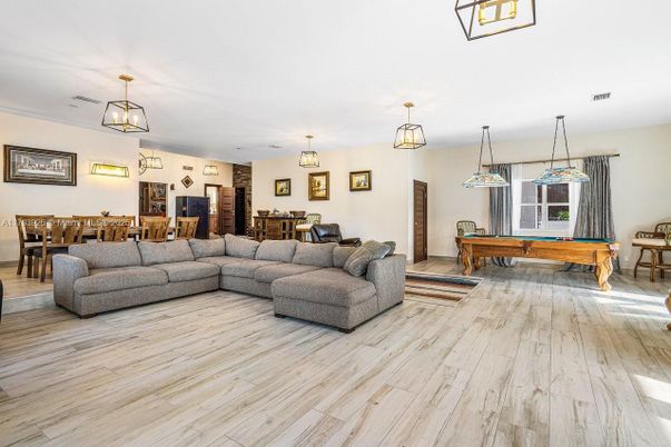 Billiard Table, Dining room, Game Room, Interior, Living room, Pendant Lights, Wood Texture Flooring