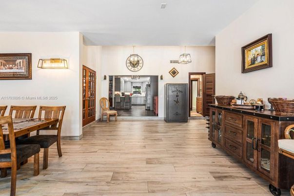 Dining room, Fireplace, Interior, Pendant Lights, Wood Texture Flooring