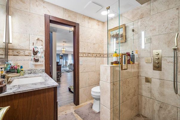 Bathroom, Chandelier, Glass Shower, Interior, Stone Walls
