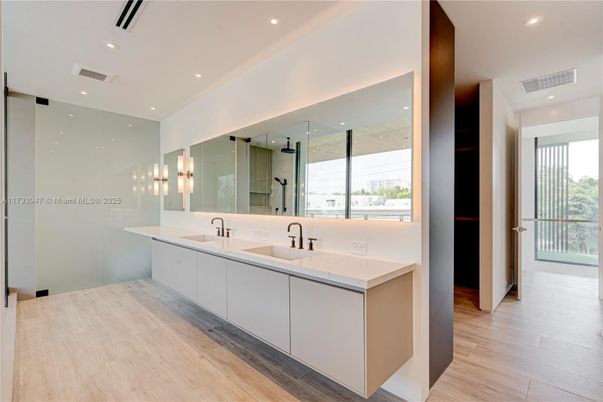 Bathroom, Dual Sink Vanities, Glass Shower, Interior, Recessed Lighting, Wood Texture Flooring