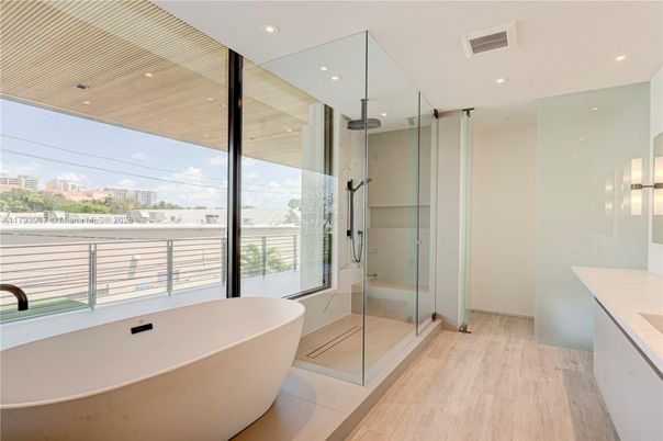 Bathroom, Free Standing Baths, Glass Shower, Interior, Recessed Lighting, Wood Texture Flooring