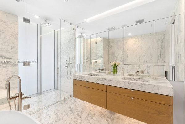 Bathroom, Dual Sink Vanities, Glass Shower, Interior, Marble, Marble Walls, Recessed Lighting