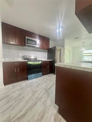 Interior, Kitchen, Marble, Pendant Lights, Stainless Steel Appliances
