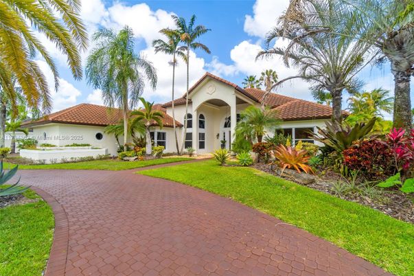 Attached, Backyard, Exterior, Facade, Spanish Mediterranean