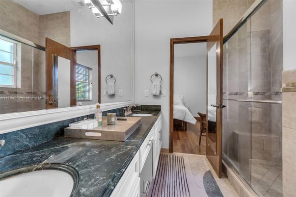 Bathroom, Dual Sink Vanities, Glass Shower, Interior, Wood Texture Flooring