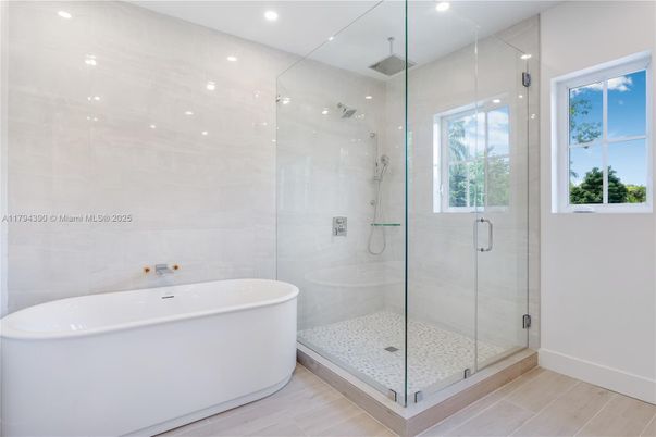 Bathroom, Free Standing Baths, Glass Shower, Interior, Recessed Lighting, Wood Texture Flooring