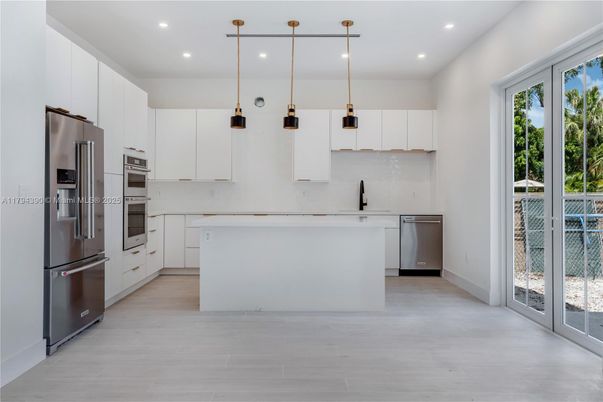 Interior, Kitchen, Pendant Lights, Recessed Lighting, Stainless Steel Appliances, Wood Texture Flooring