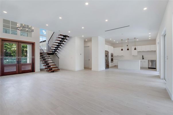 Chandelier, Interior, Kitchen, Pendant Lights, Recessed Lighting, Stainless Steel Appliances, Wood Texture Flooring