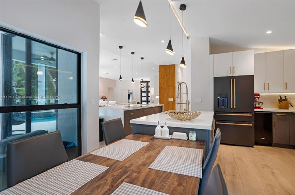 Interior, Kitchen, Pendant Lights, Recessed Lighting, Stainless Steel Appliances, Wood Texture Flooring