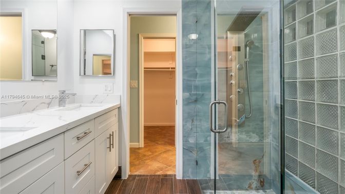 Bathroom, Dual Sink Vanities, Glass Shower, Interior, Wood Texture Flooring