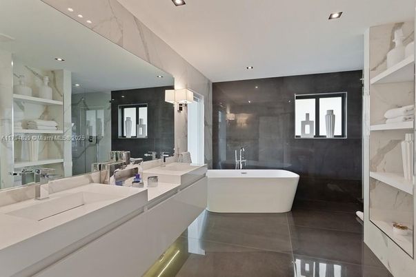 Bathroom, Dual Sink Vanities, Free Standing Baths, Glass Shower, Interior, Marble Walls, Recessed Lighting