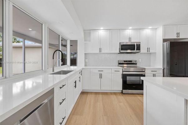 Interior, Kitchen, Recessed Lighting, Stainless Steel Appliances, Wood Texture Flooring