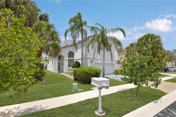 Attached, Exterior, Facade, Spanish Mediterranean
