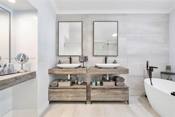 Bathroom, Dual Sink Vanities, Free Standing Baths, Interior, Recessed Lighting, Wood Texture Flooring