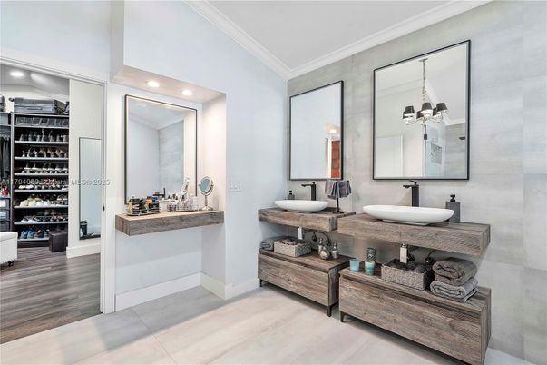 Bathroom, Dual Sink Vanities, Interior, Recessed Lighting, Walk-in Closets, Wood Texture Flooring