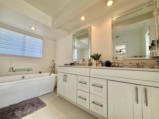 Bathroom, Dual Sink Vanities, Free Standing Baths, Interior, Recessed Lighting, Wood Texture Flooring