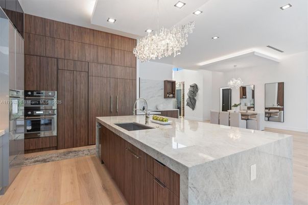 Chandelier, Interior, Kitchen, Recessed Lighting, Stainless Steel Appliances, Wood Texture Flooring