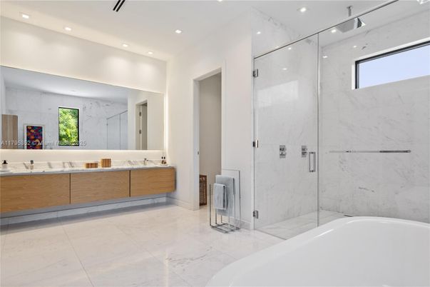 Bathroom, Dual Sink Vanities, Free Standing Baths, Glass Shower, Interior, Marble, Marble Walls, Recessed Lighting