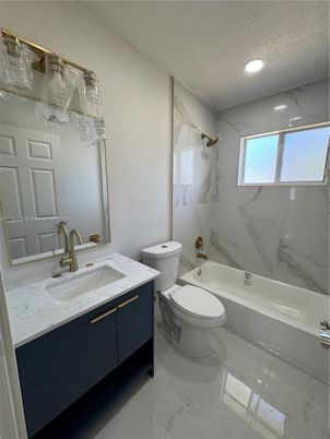 Bathroom, Dual Sink Vanities, Interior, Marble, Marble Walls, Recessed Lighting