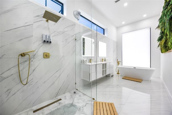 Bathroom, Dual Sink Vanities, Free Standing Baths, Glass Shower, Interior, Marble, Marble Walls, Recessed Lighting