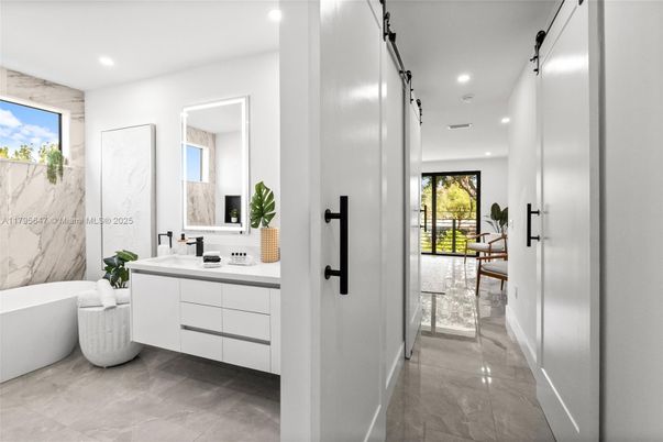 Bathroom, Dual Sink Vanities, Free Standing Baths, Interior, Marble, Marble Walls, Recessed Lighting