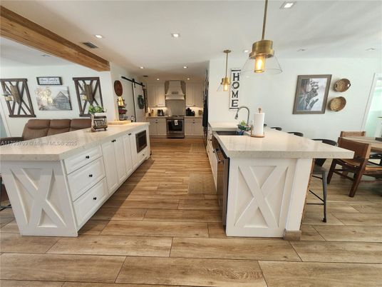 Dining room, Interior, Kitchen, Pendant Lights, Recessed Lighting, Stainless Steel Appliances, Wood Texture Flooring