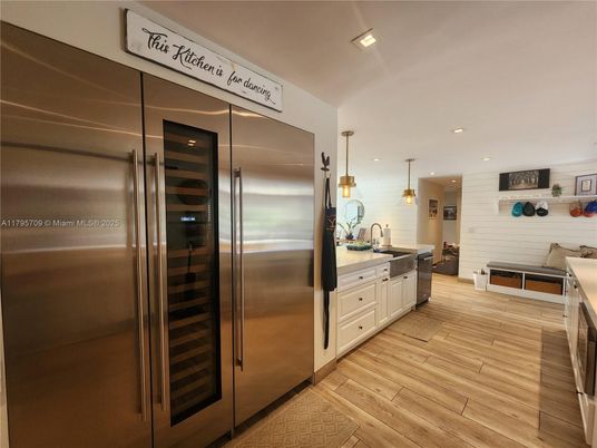 Interior, Kitchen, Pendant Lights, Recessed Lighting, Stainless Steel Appliances, Wood Texture Flooring