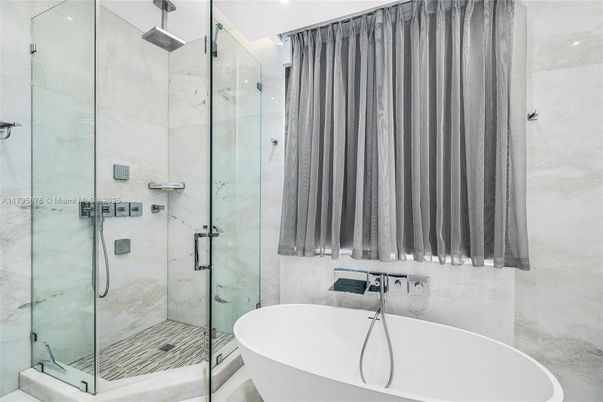 Bathroom, Free Standing Baths, Glass Shower, Interior, Marble Walls, Recessed Lighting