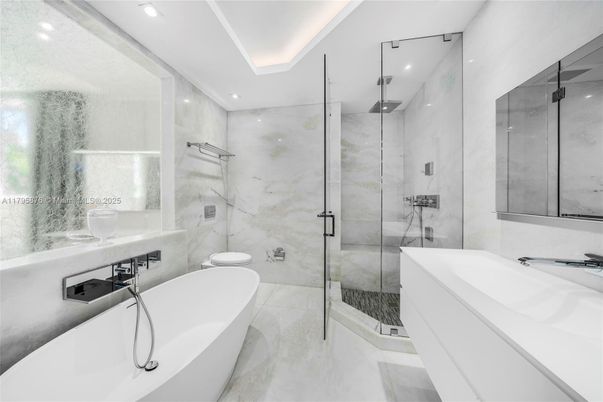 Bathroom, Free Standing Baths, Glass Shower, Interior, Marble Walls, Recessed Lighting
