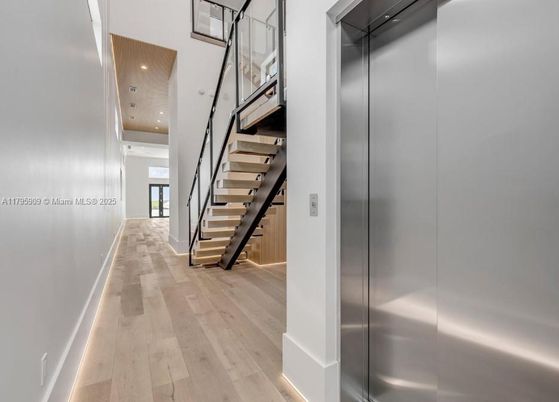 Elevator, Interior, Recessed Lighting, Wood Texture Flooring