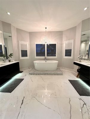 Bathroom, Chandelier, Free Standing Baths, Interior, Marble, Recessed Lighting