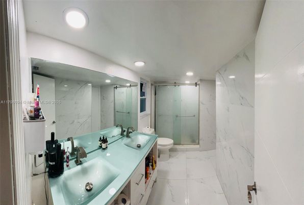 Bathroom, Dual Sink Vanities, Interior, Marble, Marble Walls, Recessed Lighting