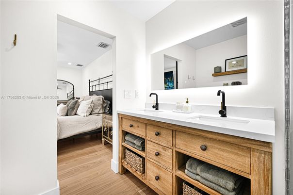 Bathroom, Bedroom, Dual Sink Vanities, Interior, Recessed Lighting, Wood Texture Flooring