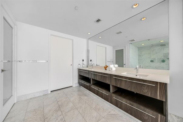 Bathroom, Dual Sink Vanities, Glass Shower, Interior, Marble, Recessed Lighting