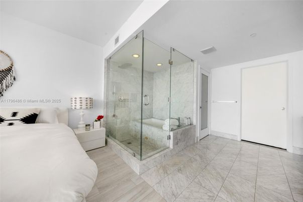 Bathroom, Bedroom, Glass Shower, Interior, Marble Walls, Recessed Lighting, Wood Texture Flooring