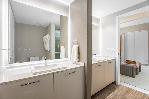 Bathroom, Dual Sink Vanities, Interior, Recessed Lighting, Wood Texture Flooring