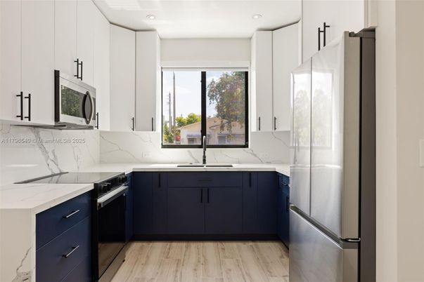 Interior, Kitchen, Marble Walls, Recessed Lighting, Wood Texture Flooring